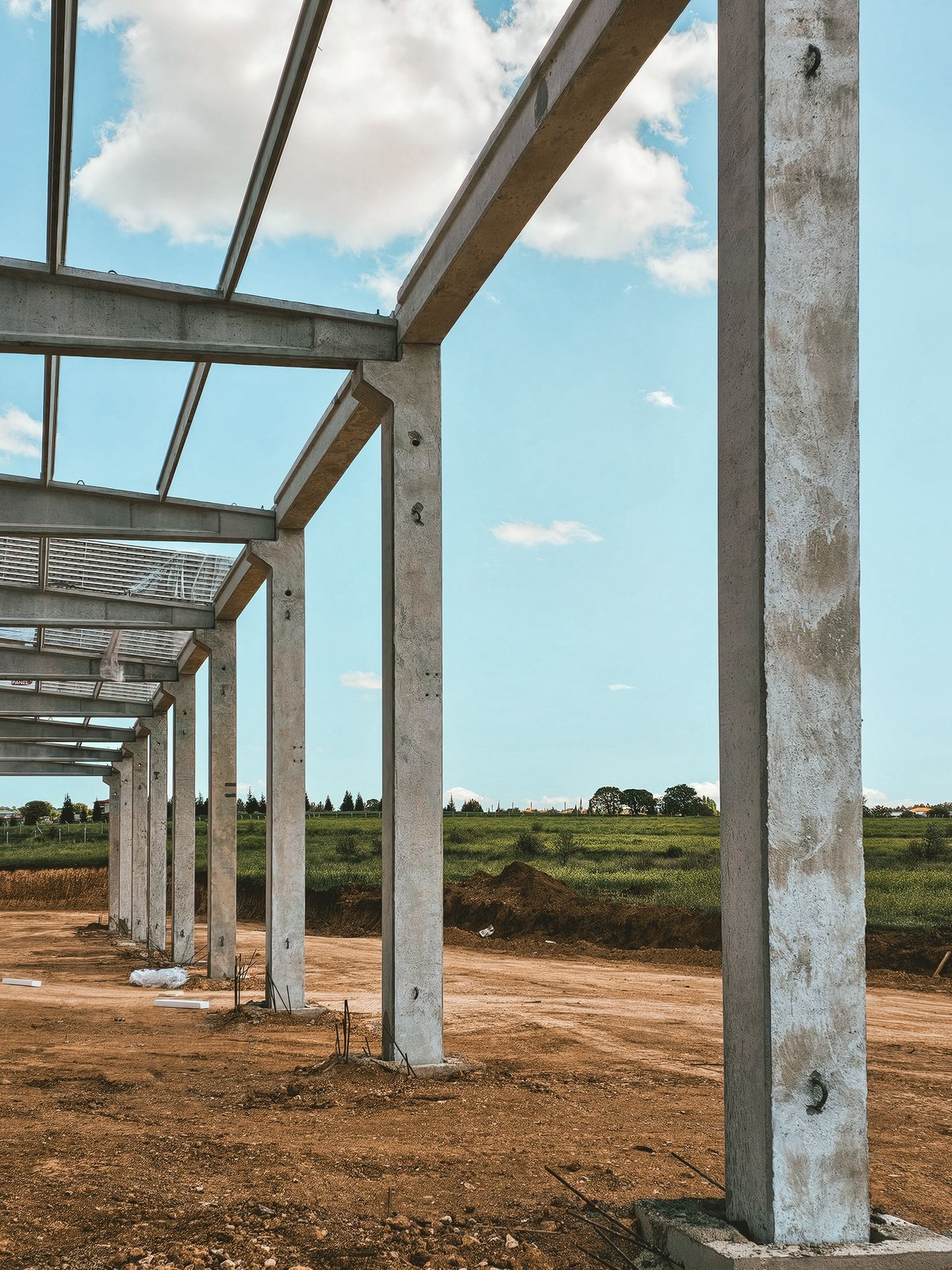Precast concrete structural columns and beams at a construction site